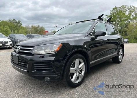 2013 Volkswagen Touareg V6 Tdi z USA, uszkodzony, nr VIN WVGEP9BP8DD005795